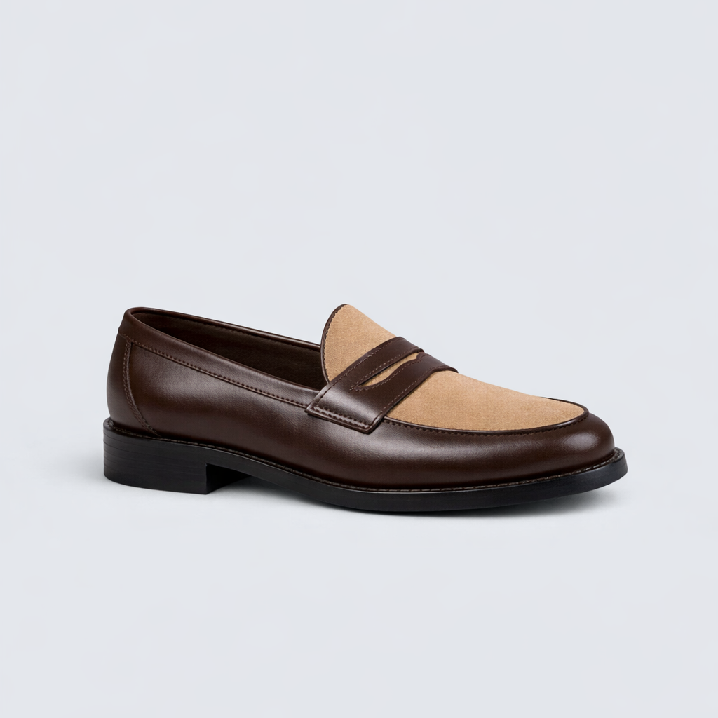 Brown and beige loafer shoe on a light gray background